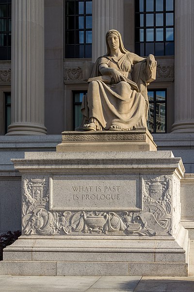 Marble statue with the inscription, "What is Past is Prologue."