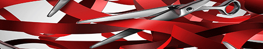 Image of scissors cutting red tape