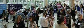 Image of the 2022 Confab Reception with exhibit booths